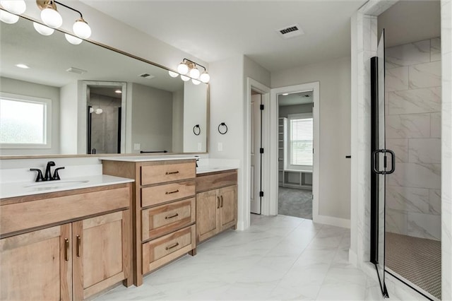 16941 S Brentwood St, Olathe, KS 66062 - full bath featuring marble finish flooring, plenty of natural light, double vanity, and a marble finish shower