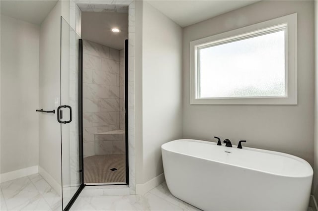 16941 S Brentwood St, Olathe, KS 66062 - bathroom featuring marble look tile flooring, a stall shower, and a freestanding bath