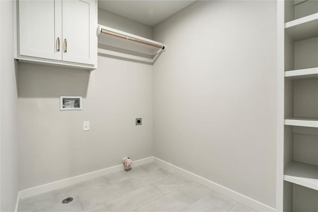 16941 S Brentwood St, Olathe, KS 66062 - laundry room with electric dryer hookup, hookup for a washing machine, cabinet space, and built in shelves
