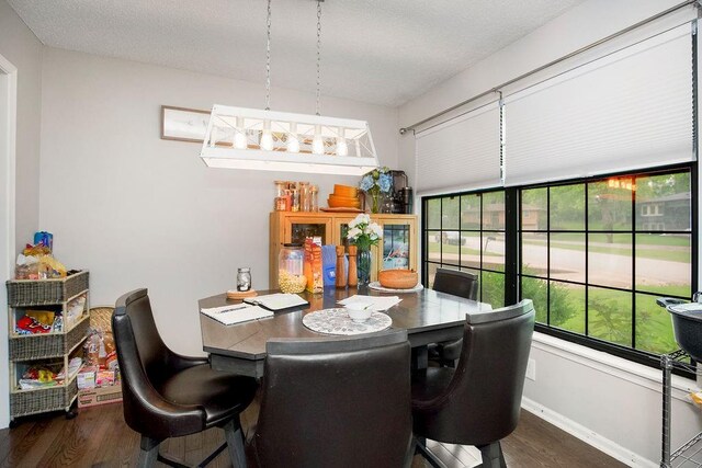 7921 Yecker St, Kansas City, KS 66102 - dining area with wood finished floors and baseboards