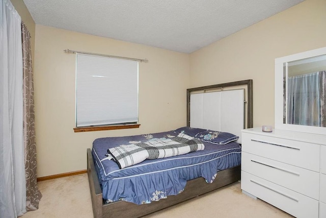 7921 Yecker St, Kansas City, KS 66102 - bedroom with light carpet and a textured ceiling