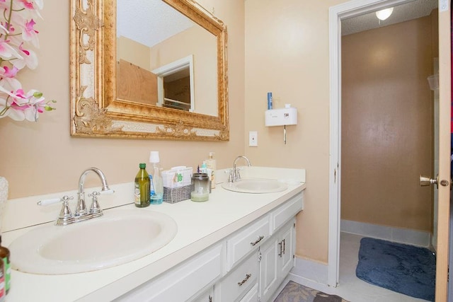 7921 Yecker St, Kansas City, KS 66102 - bathroom with double vanity and tile patterned floors
