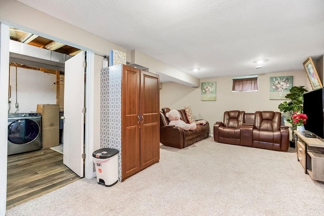 7921 Yecker St, Kansas City, KS 66102 - living area with washer / dryer and carpet floors