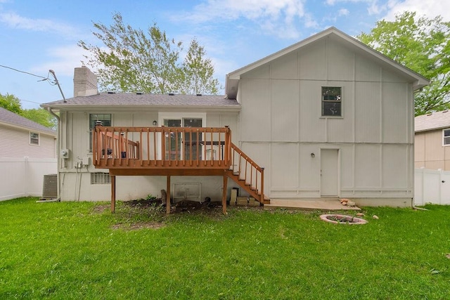 7921 Yecker St, Kansas City, KS 66102 - rear view of property featuring a chimney, a deck, and stairs