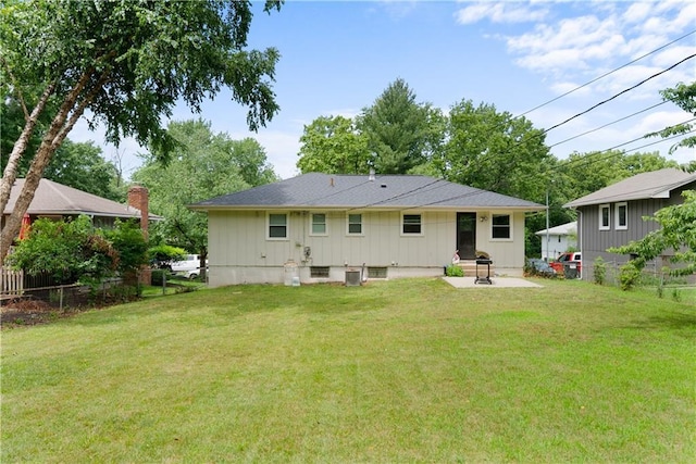 13211 Craig Ave, Grandview, MO 64030 - back of property with a patio area