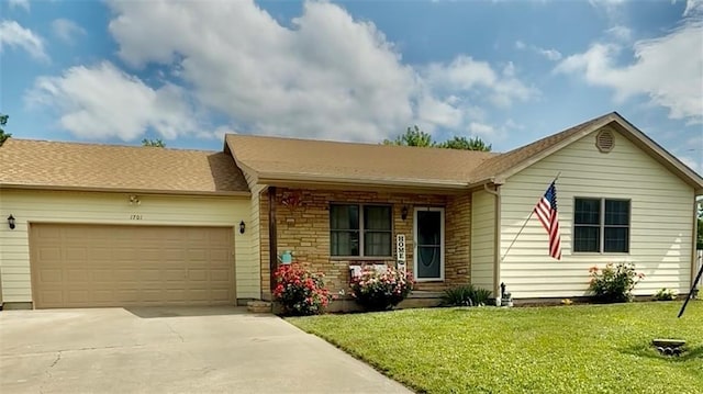 1701 S Maple St, Ottawa, KS 66067 - ranch-style house with a garage, driveway, a front yard, and a porch
