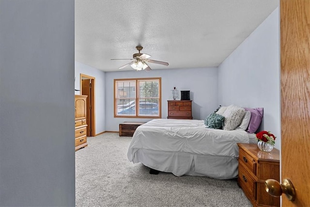 1701 S Maple St, Ottawa, KS 66067 - bedroom with carpet, a textured ceiling, and ceiling fan