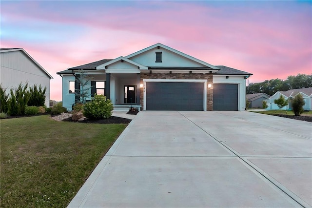 19013 W 188th Ter, Spring Hill, KS 66083 - view of front facade with a garage, a lawn, concrete driveway, and stone siding