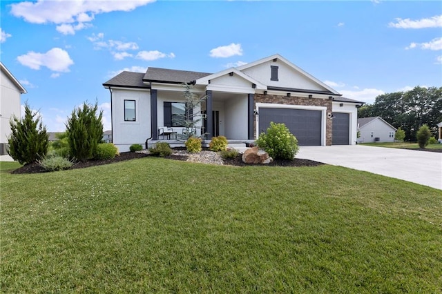 19013 W 188th Ter, Spring Hill, KS 66083 - view of front facade featuring a porch, concrete driveway, an attached garage, a front yard, and stucco siding