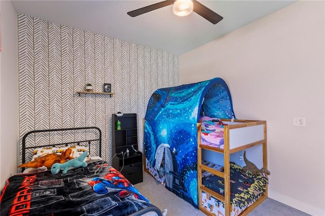 19013 W 188th Ter, Spring Hill, KS 66083 - carpeted bedroom with wallpapered walls, an accent wall, and ceiling fan