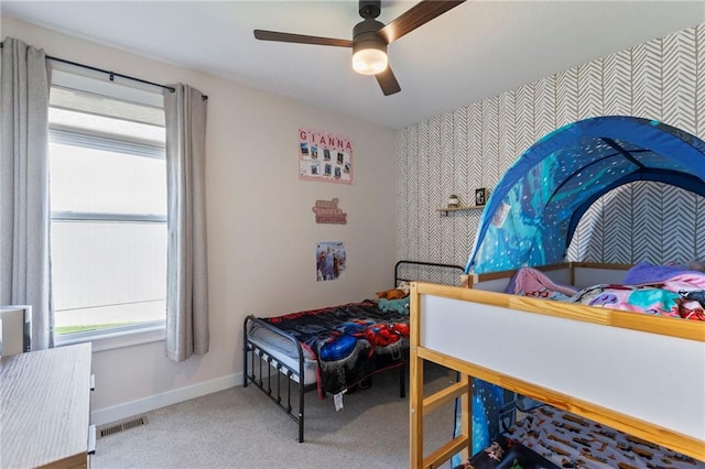 19013 W 188th Ter, Spring Hill, KS 66083 - bedroom featuring multiple windows, carpet, a ceiling fan, and wallpapered walls