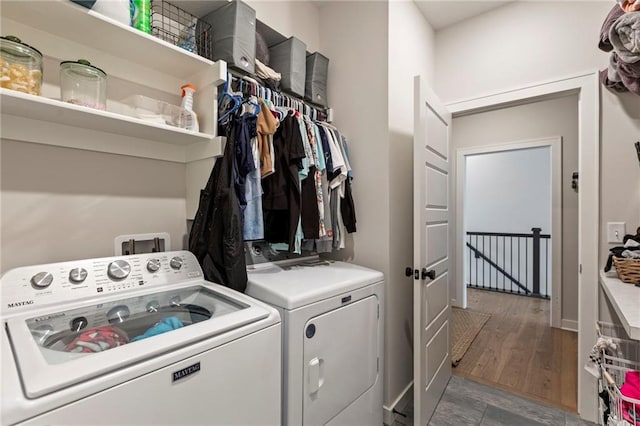 19013 W 188th Ter, Spring Hill, KS 66083 - washroom with separate washer and dryer and wood finished floors