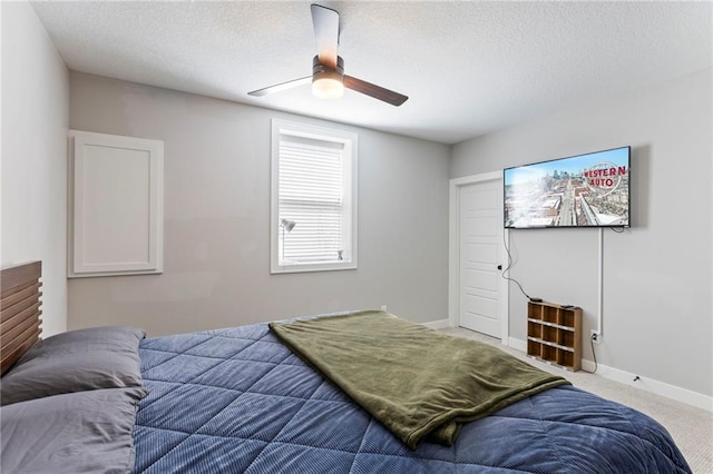 19013 W 188th Ter, Spring Hill, KS 66083 - bedroom featuring a textured ceiling, ceiling fan, and carpet flooring