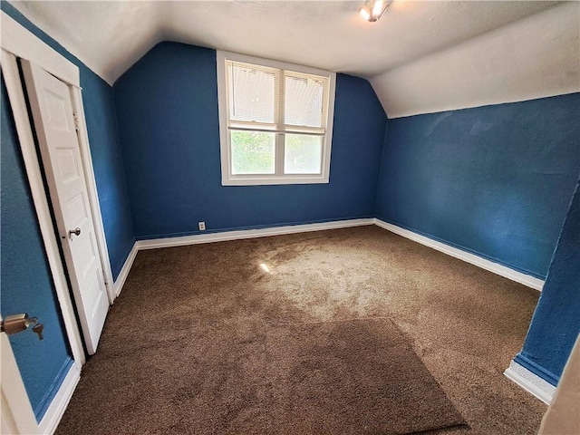 3009 Montgall Ave, Kansas City, MO 64128 - bonus room featuring vaulted ceiling and carpet floors