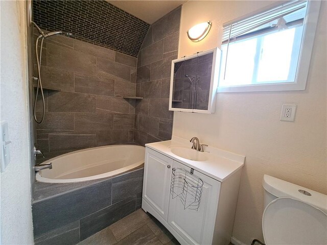 3009 Montgall Ave, Kansas City, MO 64128 - full bath with vanity and tiled shower / bath combo