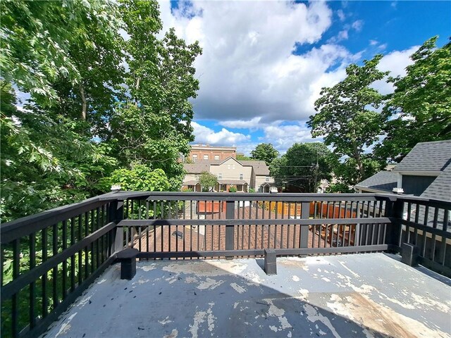 3009 Montgall Ave, Kansas City, MO 64128 - view of patio / terrace featuring a residential view and a wooden deck