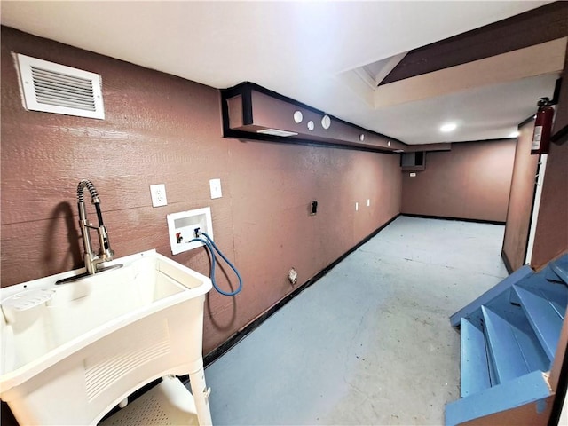 3009 Montgall Ave, Kansas City, MO 64128 - finished basement with a sink