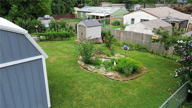 1736 Brook St, Lawrence, KS 66044 - fenced backyard featuring a shed