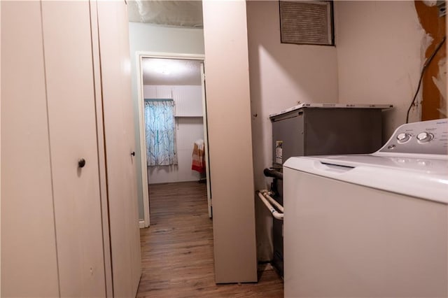 1736 Brook St, Lawrence, KS 66044 - washroom featuring washer / dryer and wood finished floors