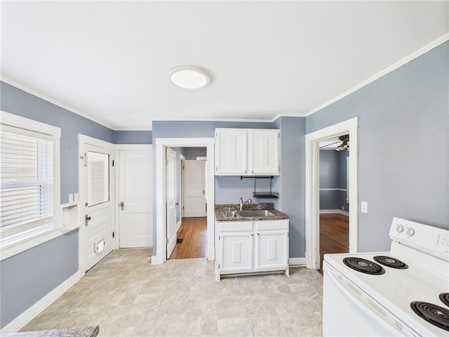 411 S Bismark, Concordia, MO 64020 - kitchen featuring electric stove, ornamental molding, and white cabinetry