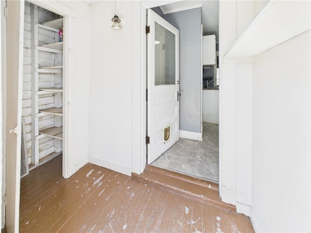 411 S Bismark, Concordia, MO 64020 - hallway with hardwood / wood-style flooring and baseboards