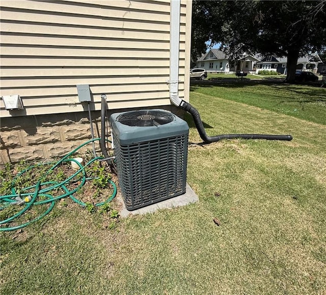 411 S Bismark, Concordia, MO 64020 - exterior view of a central AC unit