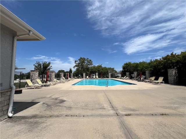 11681 S Roundtree St, Olathe, KS 66061 - community pool featuring a patio