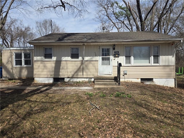 706 W Charles Ct, Independence, MO 64055 - view of front of home featuring entry steps, board and batten siding, and roof with shingles