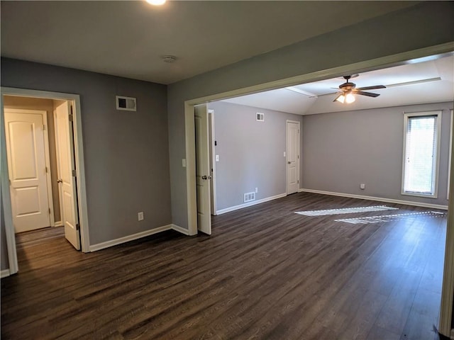 10122 Earnshaw St, Lenexa, KS 66215 - unfurnished room featuring dark wood-style flooring, a ceiling fan, a smoke detector, and lofted ceiling