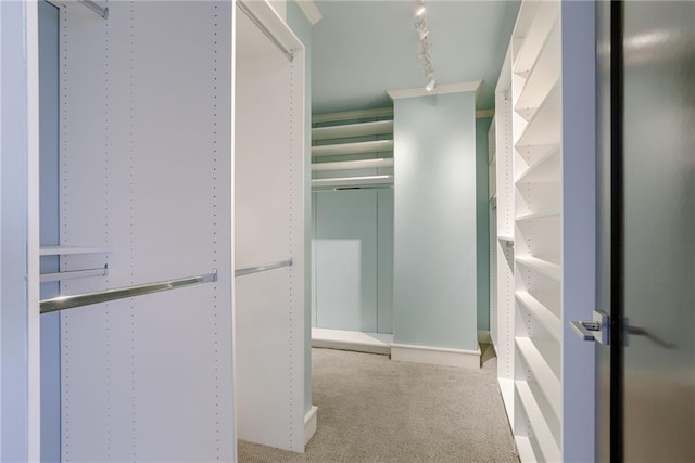 2510 Grand Blvd Unit 2502-03, Kansas City, MO 64108 - walk in closet featuring carpet