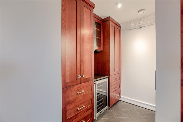 2510 Grand Blvd Unit 2502-03, Kansas City, MO 64108 - bar featuring wine cooler and rail lighting