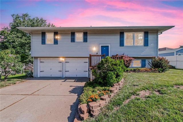 19308 E 18th St N, Independence, MO 64058 - split foyer home with a garage and concrete driveway