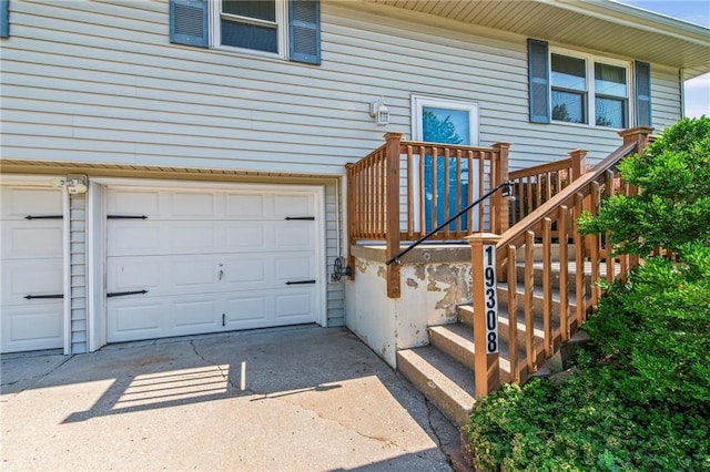19308 E 18th St N, Independence, MO 64058 - entrance to property featuring an attached garage and concrete driveway