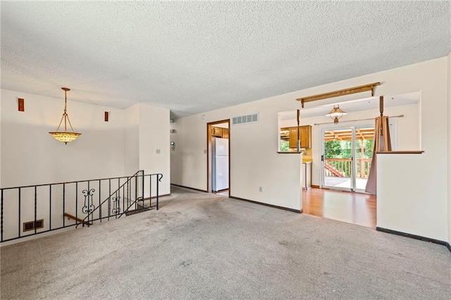 19308 E 18th St N, Independence, MO 64058 - unfurnished room with carpet floors and a textured ceiling