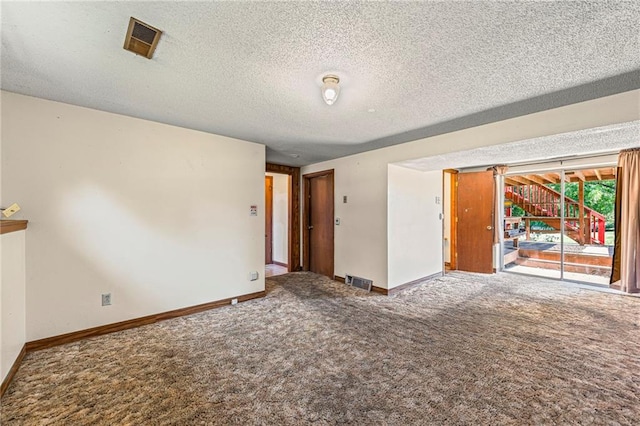 19308 E 18th St N, Independence, MO 64058 - unfurnished room with carpet floors and a textured ceiling