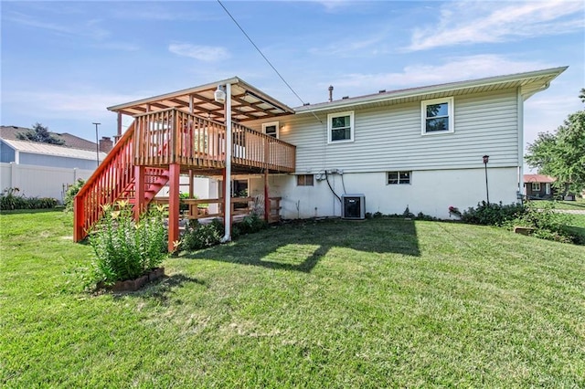 19308 E 18th St N, Independence, MO 64058 - back of property featuring a deck, a yard, and stairs