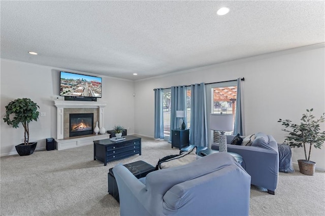 2712 SW Carlton Dr, Lees Summit, MO 64082 - living room with a textured ceiling, carpet, crown molding, a tiled fireplace, and recessed lighting