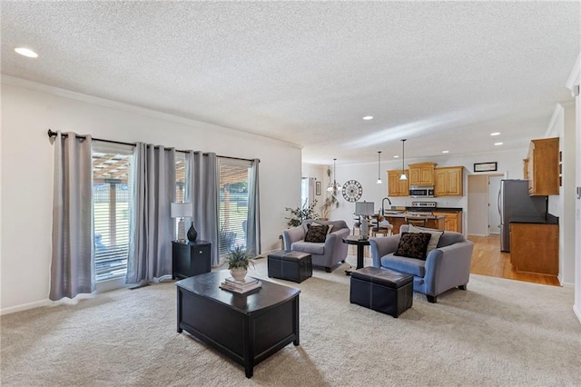 2712 SW Carlton Dr, Lees Summit, MO 64082 - living room featuring light carpet, ornamental molding, a textured ceiling, and recessed lighting