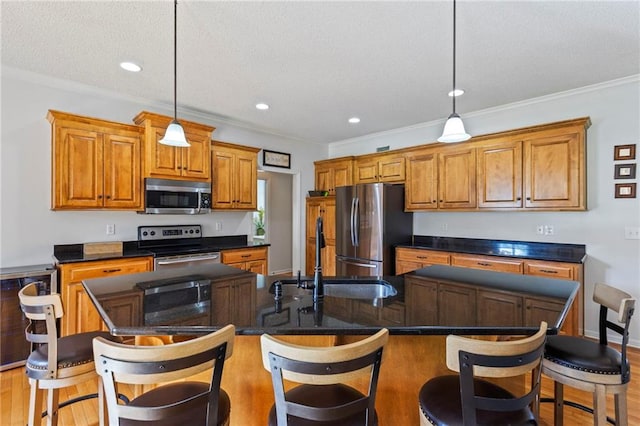 2712 SW Carlton Dr, Lees Summit, MO 64082 - kitchen with stainless steel appliances, brown cabinetry, pendant lighting, light wood-style flooring, and ornamental molding