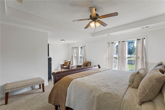 2712 SW Carlton Dr, Lees Summit, MO 64082 - carpeted bedroom featuring a raised ceiling, ornamental molding, a textured ceiling, and a ceiling fan