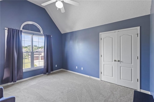 2712 SW Carlton Dr, Lees Summit, MO 64082 - unfurnished bedroom featuring carpet, vaulted ceiling, ceiling fan, and a closet