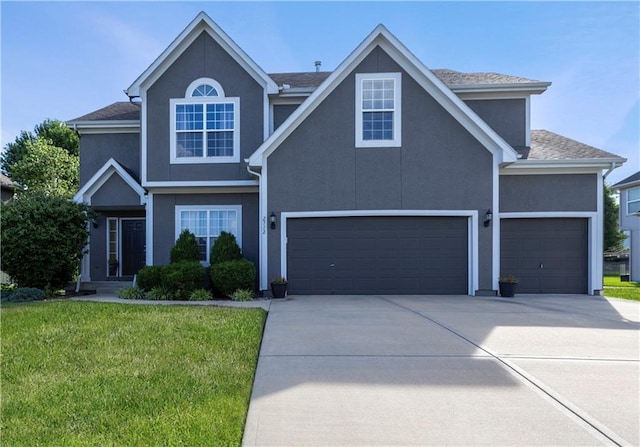 2712 SW Carlton Dr, Lees Summit, MO 64082 - traditional home with driveway, an attached garage, a front lawn, and stucco siding