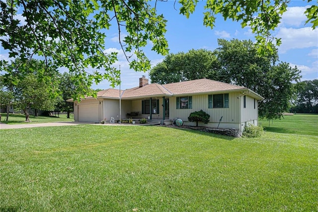 21830 155th St, Basehor, KS 66007 - single story home with a chimney, a front lawn, an attached garage, and concrete driveway