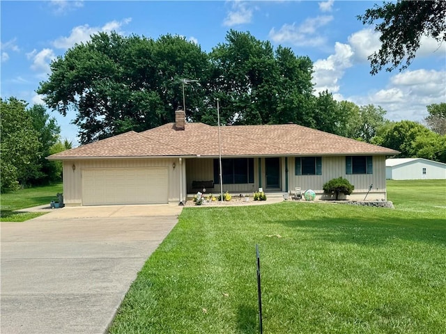 21830 155th St, Basehor, KS 66007 - ranch-style home with a garage, a chimney, a front yard, and concrete driveway