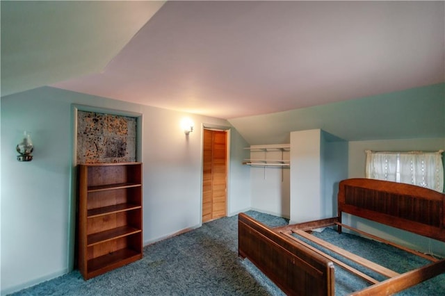 1134 Atchison St, Atchison, KS 66002 - carpeted bedroom featuring lofted ceiling and a closet