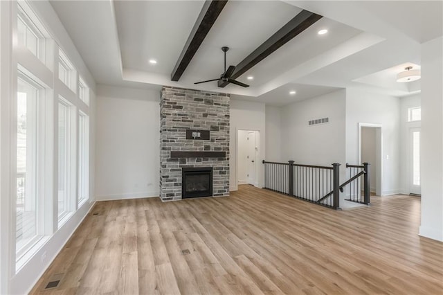13491 Terrace Park Dr, Parkville, MO 64152 - unfurnished living room with ceiling fan, beam ceiling, light wood-style floors, recessed lighting, and a fireplace