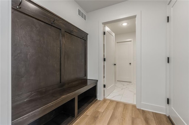 13491 Terrace Park Dr, Parkville, MO 64152 - mudroom featuring light marble finish flooring and baseboards