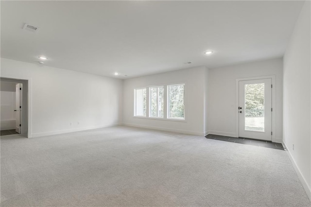 13491 Terrace Park Dr, Parkville, MO 64152 - unfurnished room featuring light colored carpet and recessed lighting