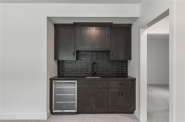 13491 Terrace Park Dr, Parkville, MO 64152 - indoor wet bar with wine cooler, backsplash, and light colored carpet