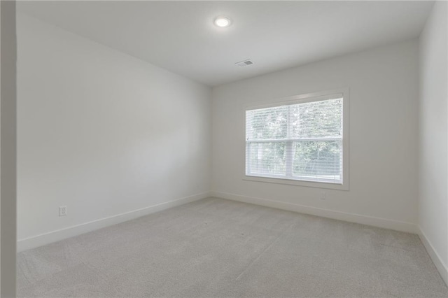 13491 Terrace Park Dr, Parkville, MO 64152 - spare room with light colored carpet and recessed lighting